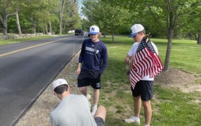 Norwell Baseball Team Lines Main Streets with American Flags for Memorial Day
