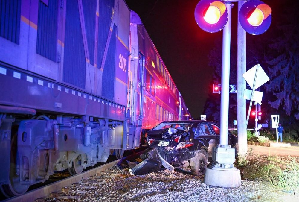 Train Collides with Car in Cohasset